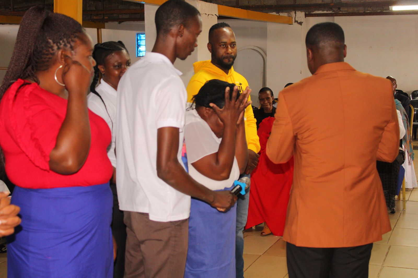 Praying with a member of the congregation
